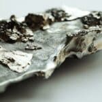 a piece of metal that is sitting on a table