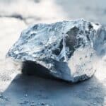 The Samarium appears as a hard, silvery-white metal with a smooth yet slightly rugged surface, showcasing its stability in air.