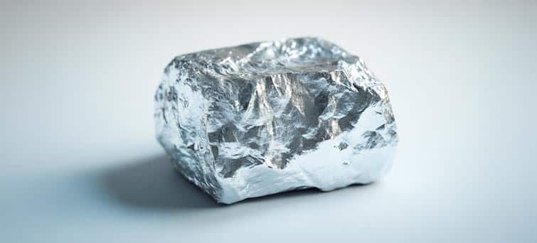 a piece of tin foil sitting on top of a table, Lutetium